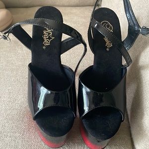 Never worn Pleaser heels.